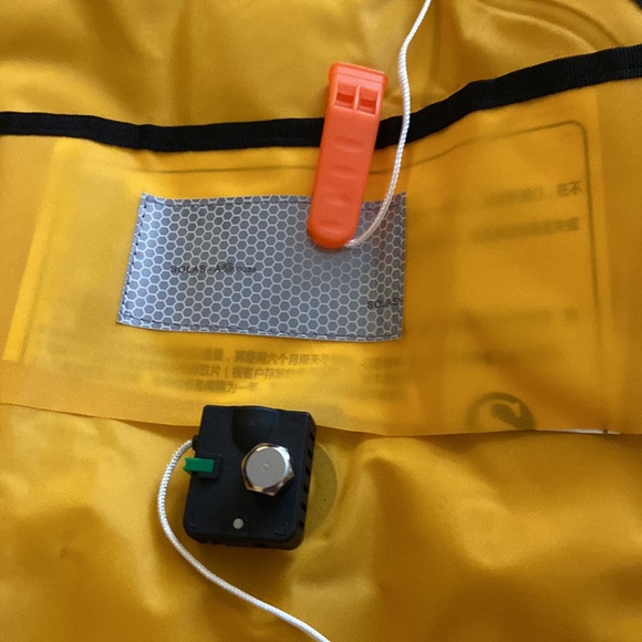 Life jacket. Never worn. New with tags. Manual inflatable jacket - Picture 8 of 13